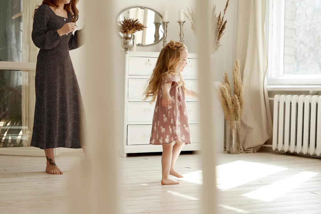 Mom and daughter enjoying summer time at home